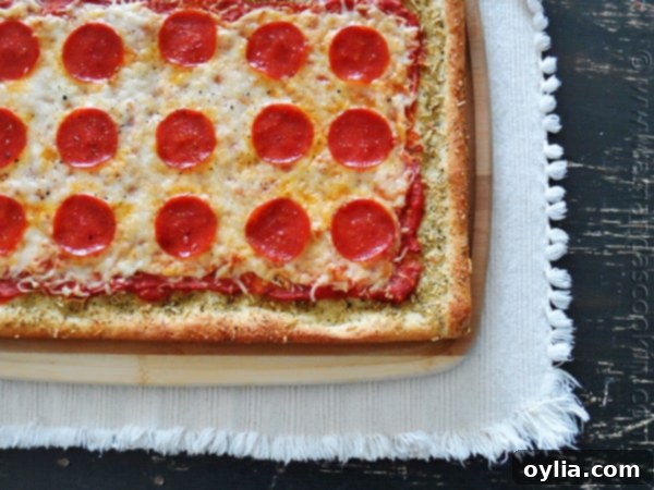 An overhead photo of garlic bread crusted classic pizza.