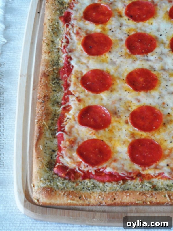A close up photo of garlic bread crusted classic pizza.