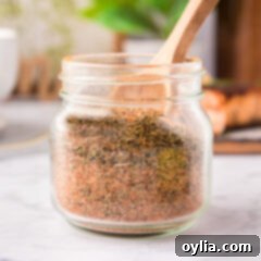 Close up photo of a jar of Cajun Seasoning
