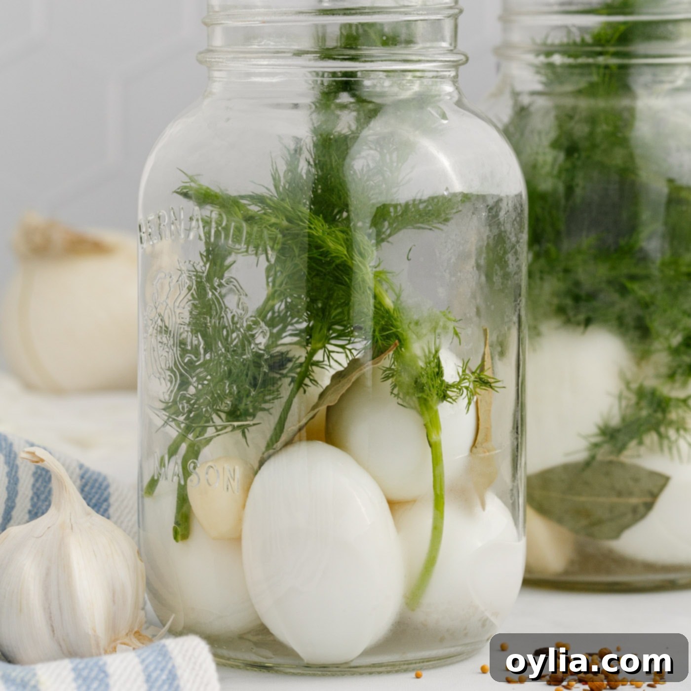 hard boiled eggs and fresh herbs in a mason jar