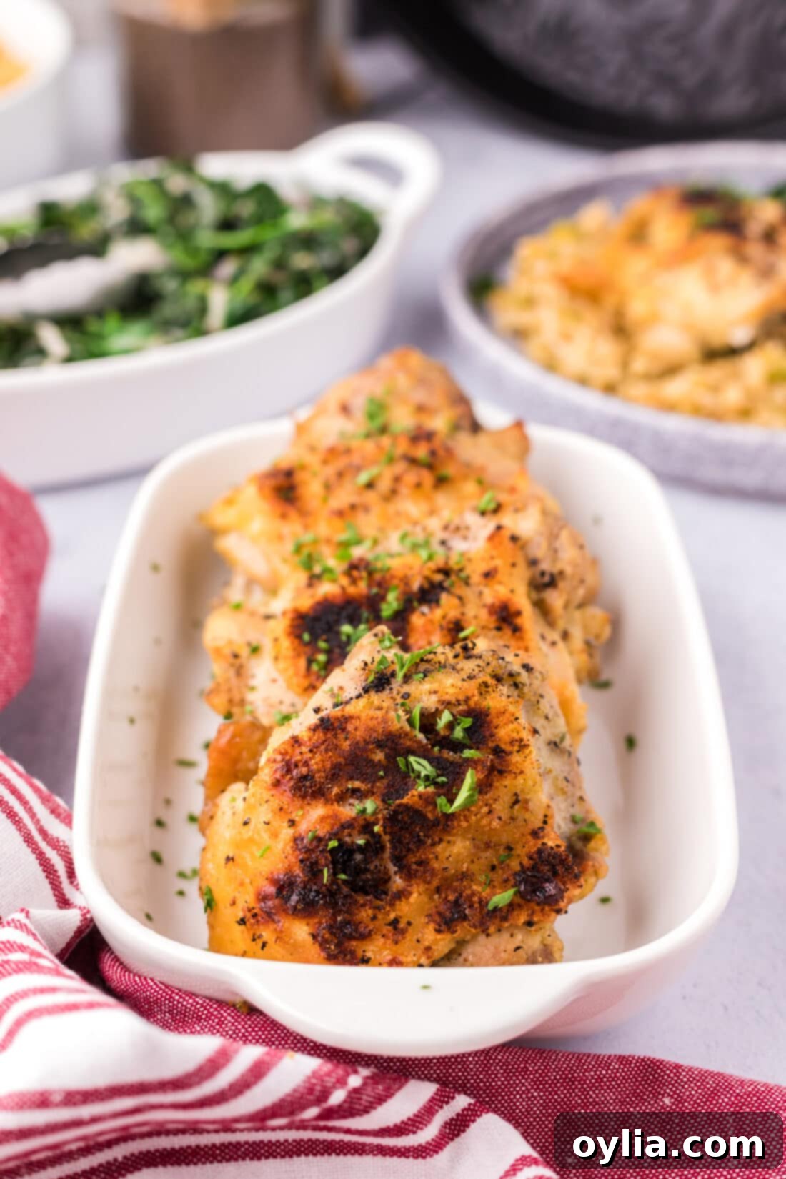 Instant Pot Chicken Thighs arranged beautifully in a serving dish, ready to be enjoyed.
