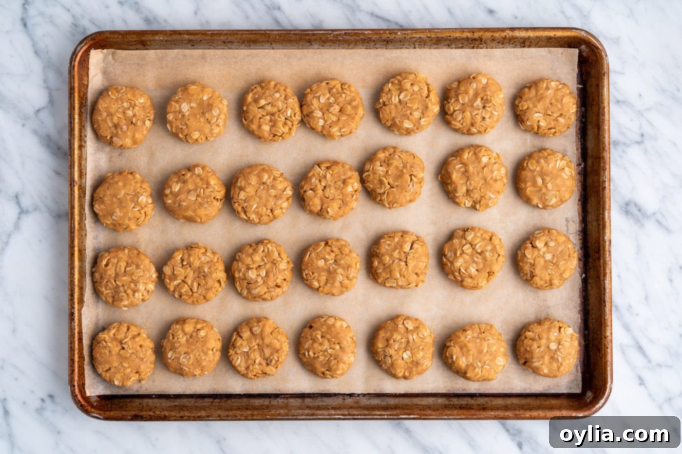 no bake peanut butter cookies on a baking sheet resting