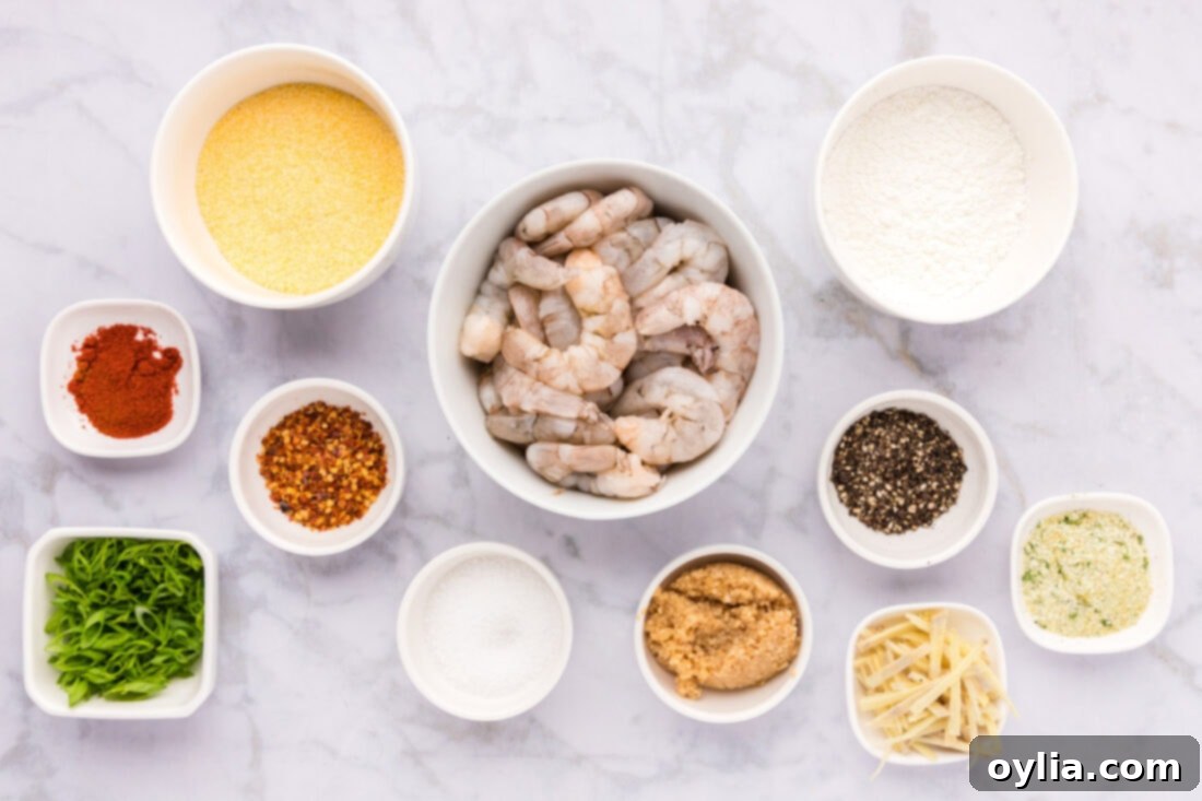 All ingredients for Salt and Pepper Shrimp laid out on a table.
