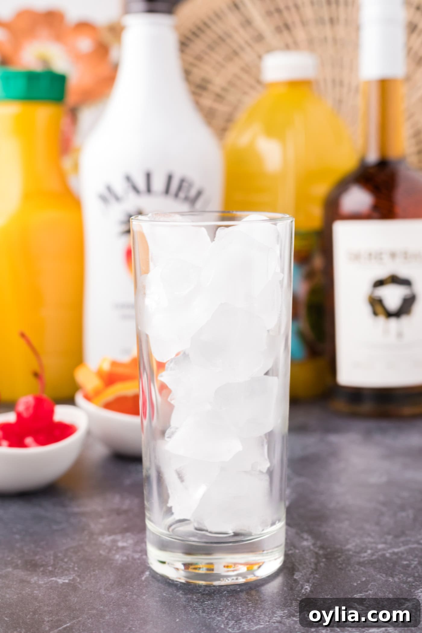 highball glass filled with ice