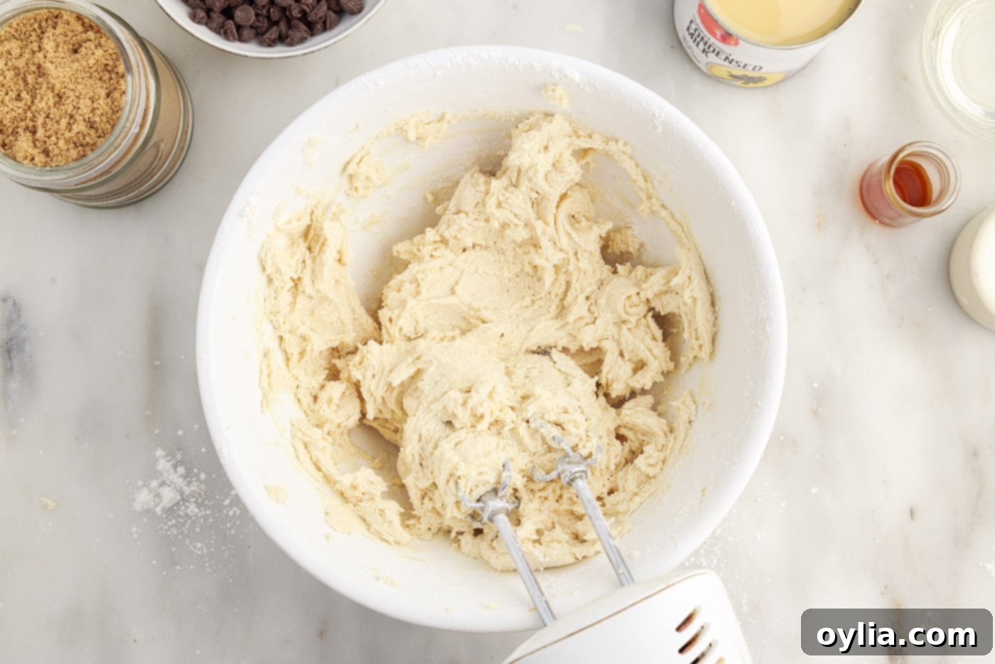 The finished shortbread dough in a mixing bowl, ready to be pressed into the pan.