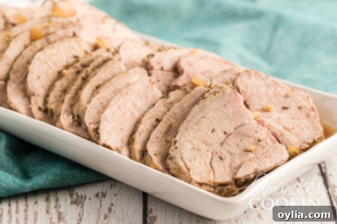 The Ultimate Sirloin Pork Roast Recipe 11 sliced roasted pork on a platter