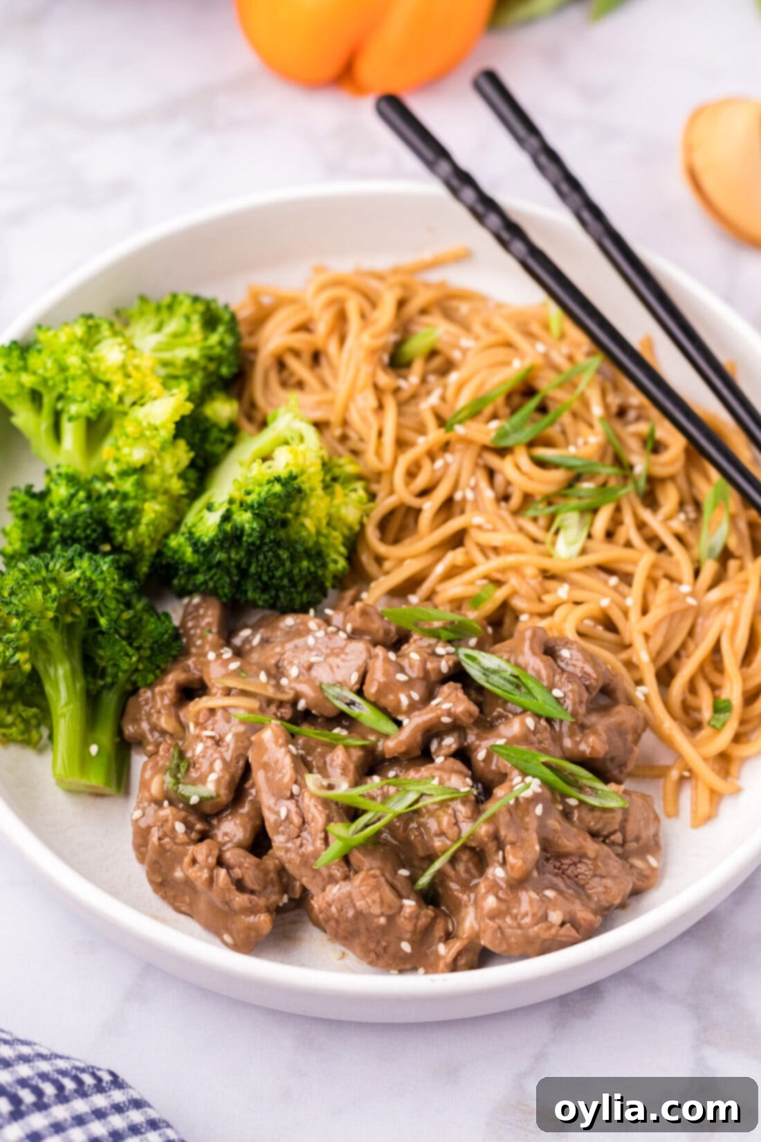 Teriyaki Glazed Beef 3 Beef Teriyaki served with perfectly cooked broccoli and teriyaki noodles, ready to eat