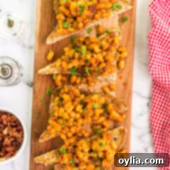 Beans on Toast on a wooden platter