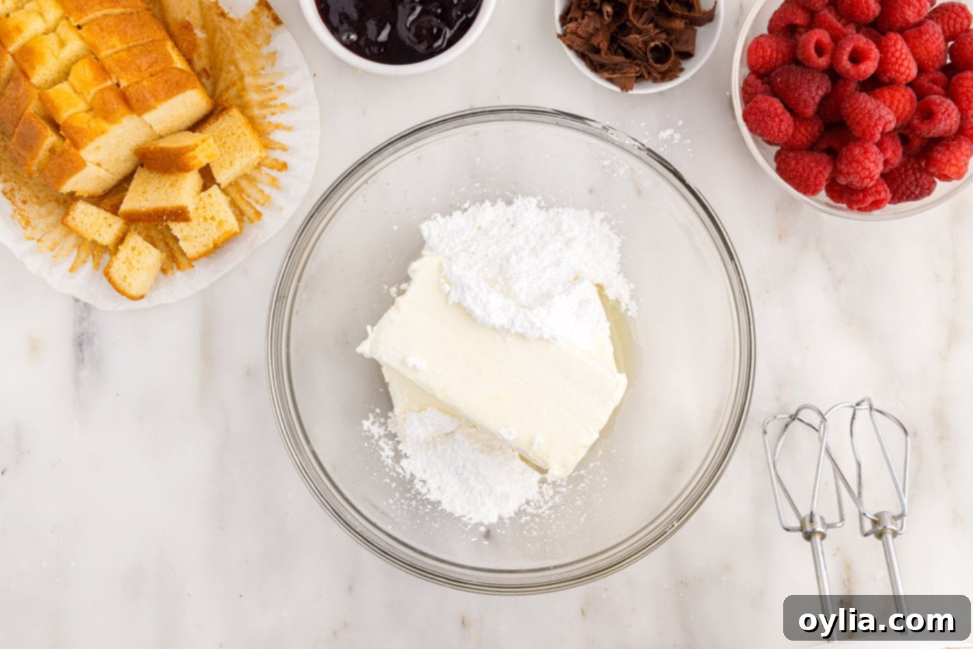 cream cheese, lemon juice, and powdered sugar in a mixing bowl