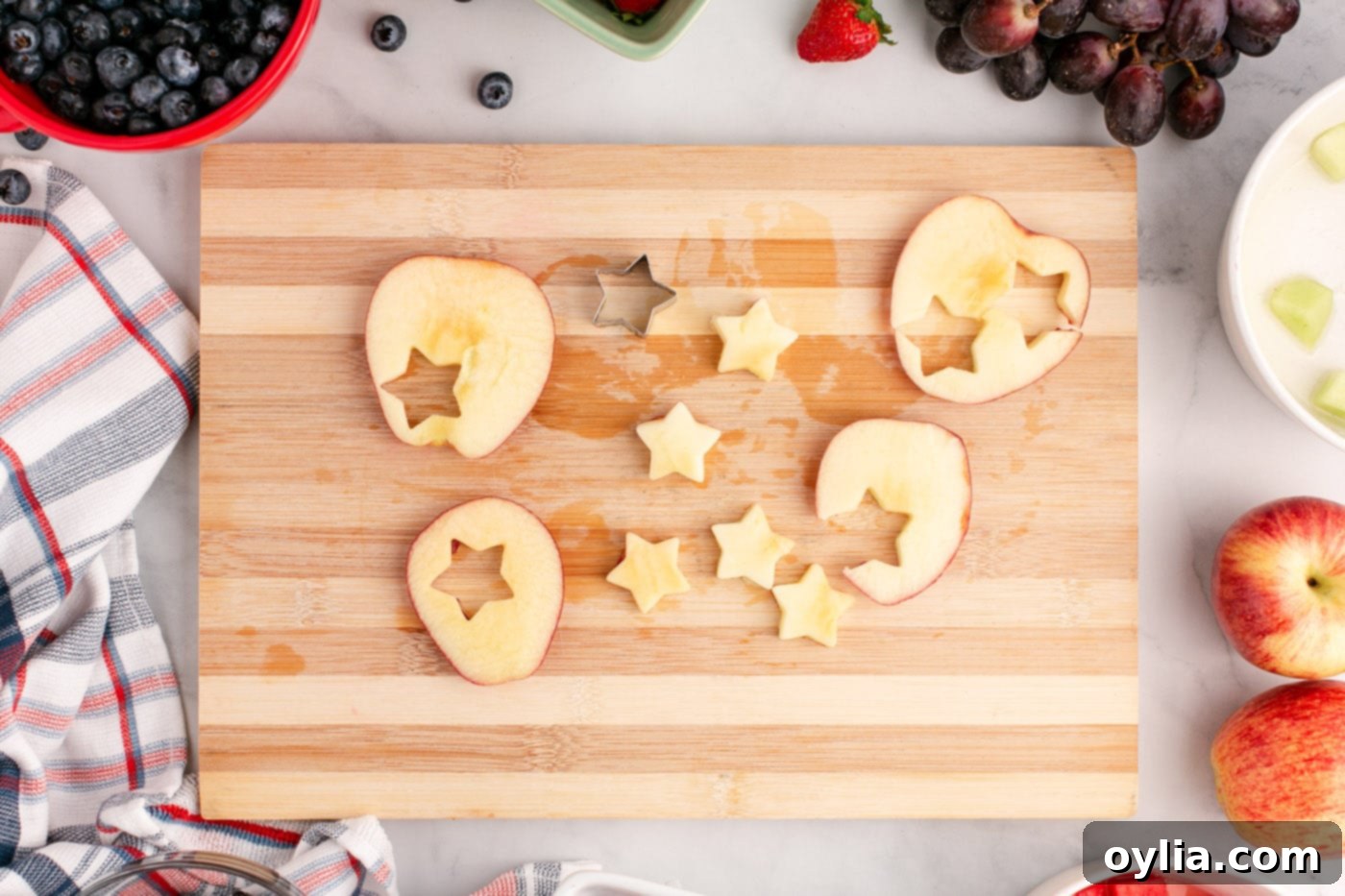 Cutting star shapes out of apples