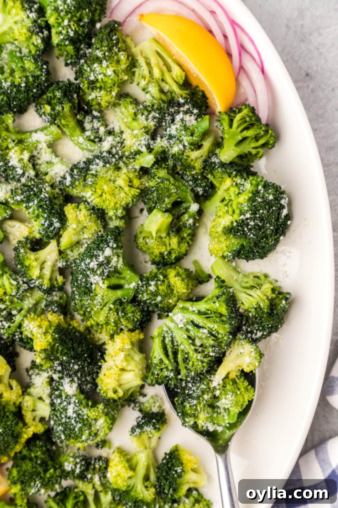 Close up photo of Instant Pot Broccoli on a platter, showcasing its vibrant green color and tender texture.