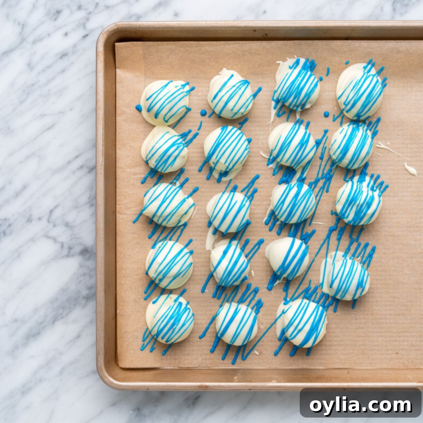 blue drizzle over oreo truffles
