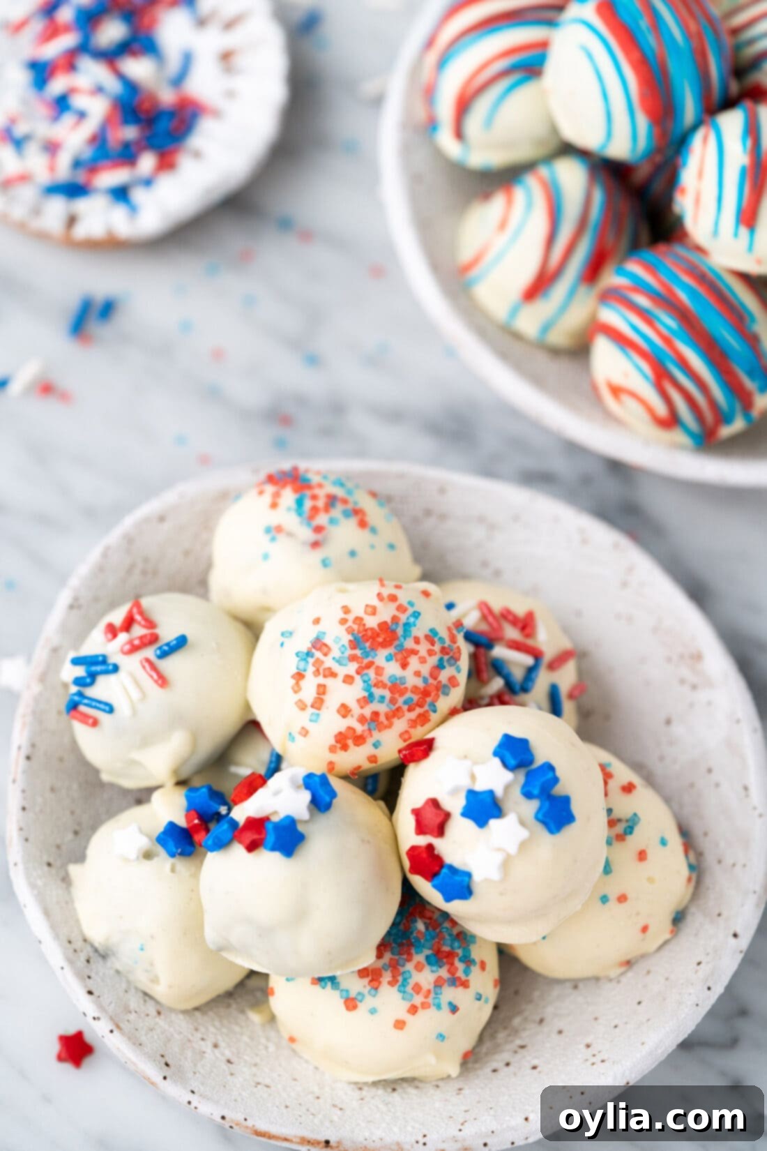 Two bowls of Red White and Blue Oreo Truffles