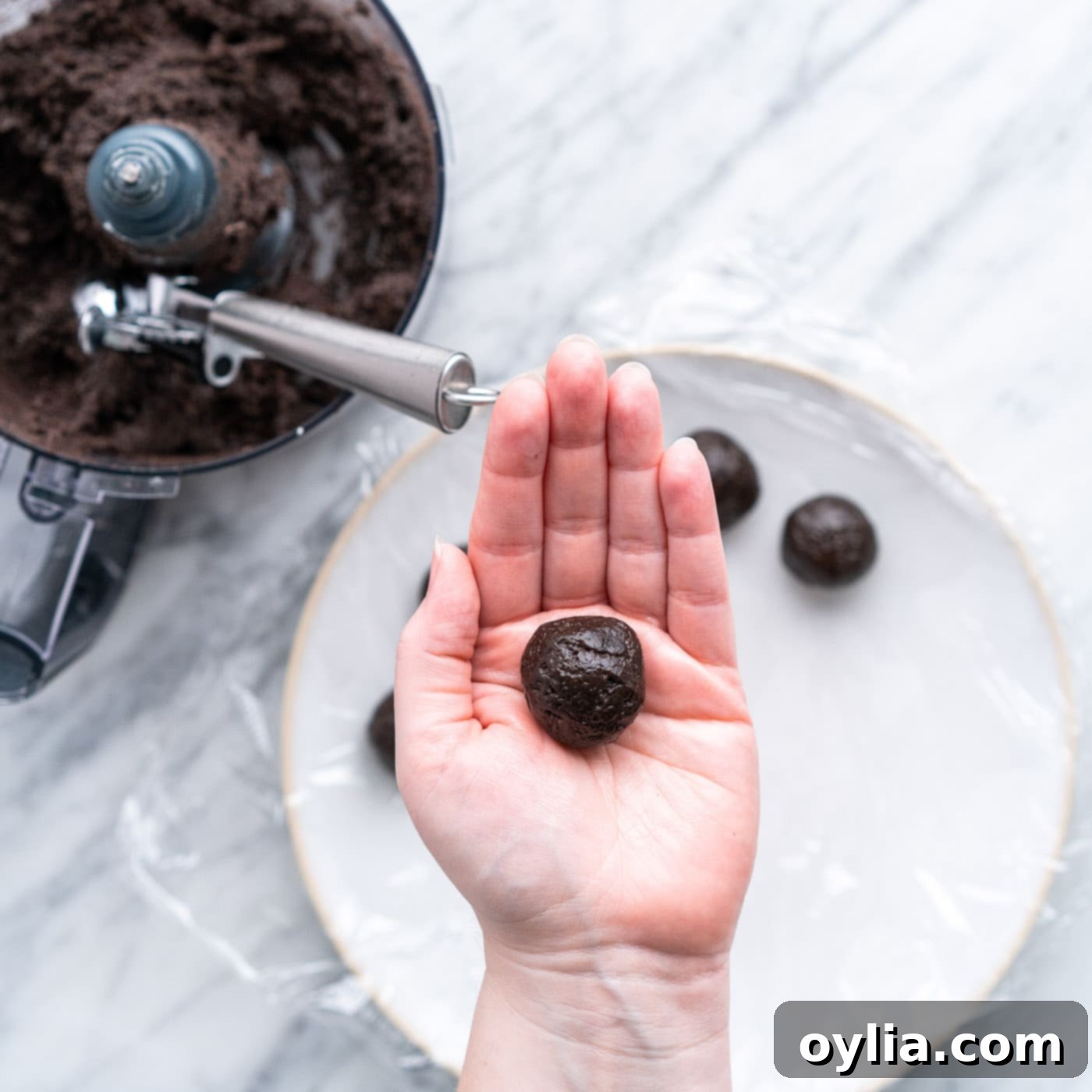 rolling oreo truffles into a ball