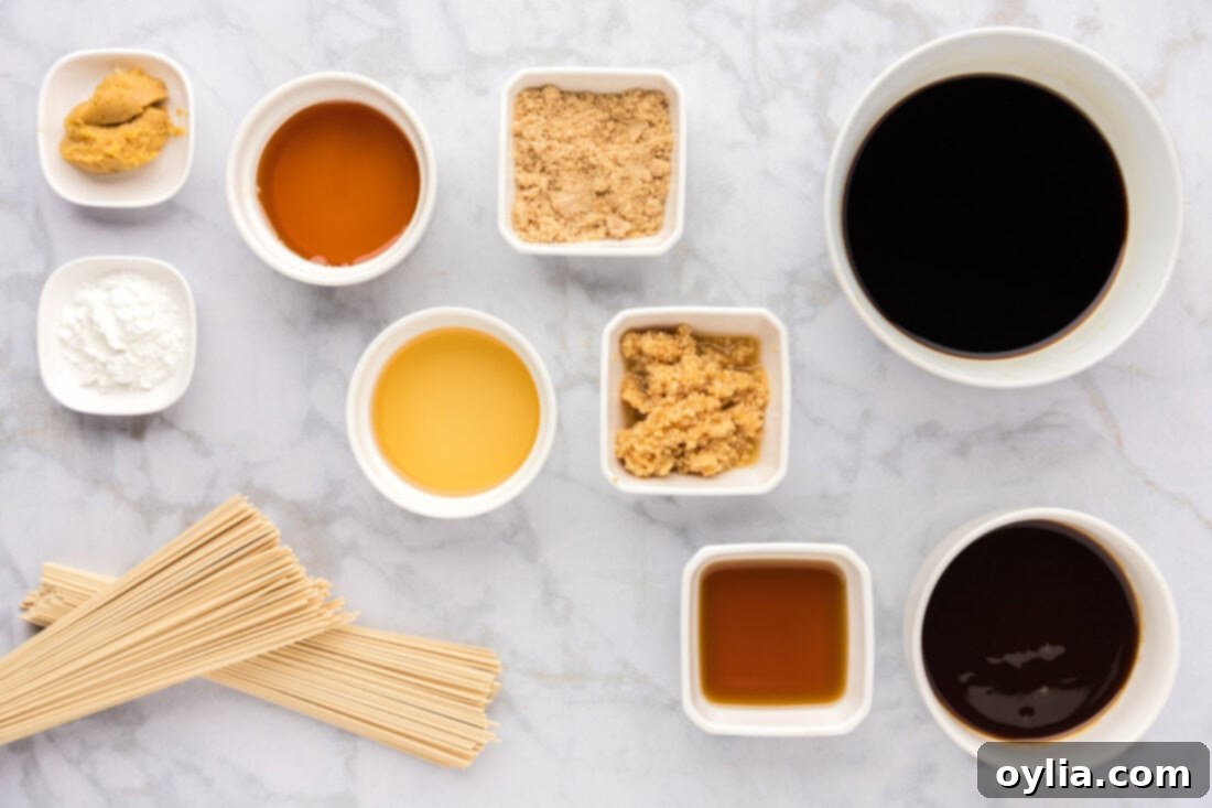 Individual ingredients for Teriyaki Noodles laid out on a table