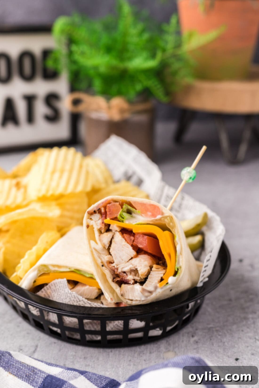 Chicken Bacon Ranch Wrap in a basket with chips