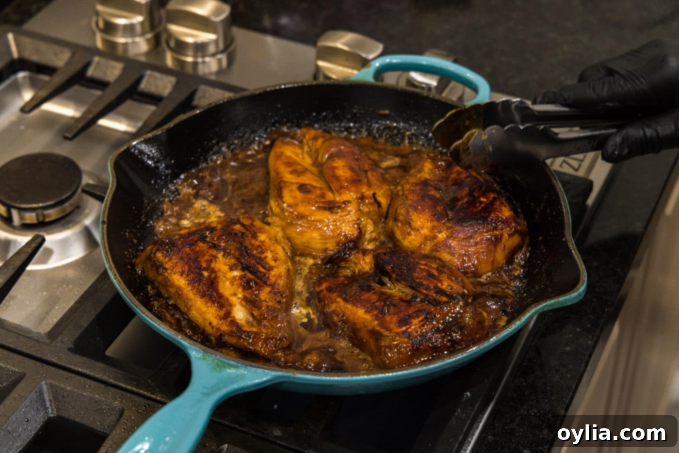 honey garlic chicken breasts in a skillet