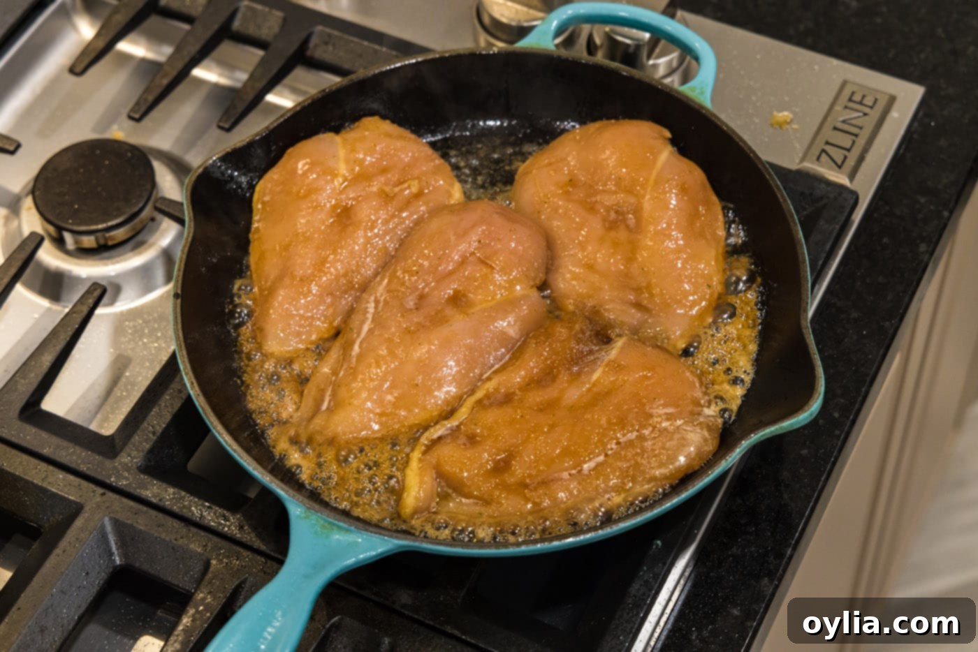 chicken breasts in a skillet
