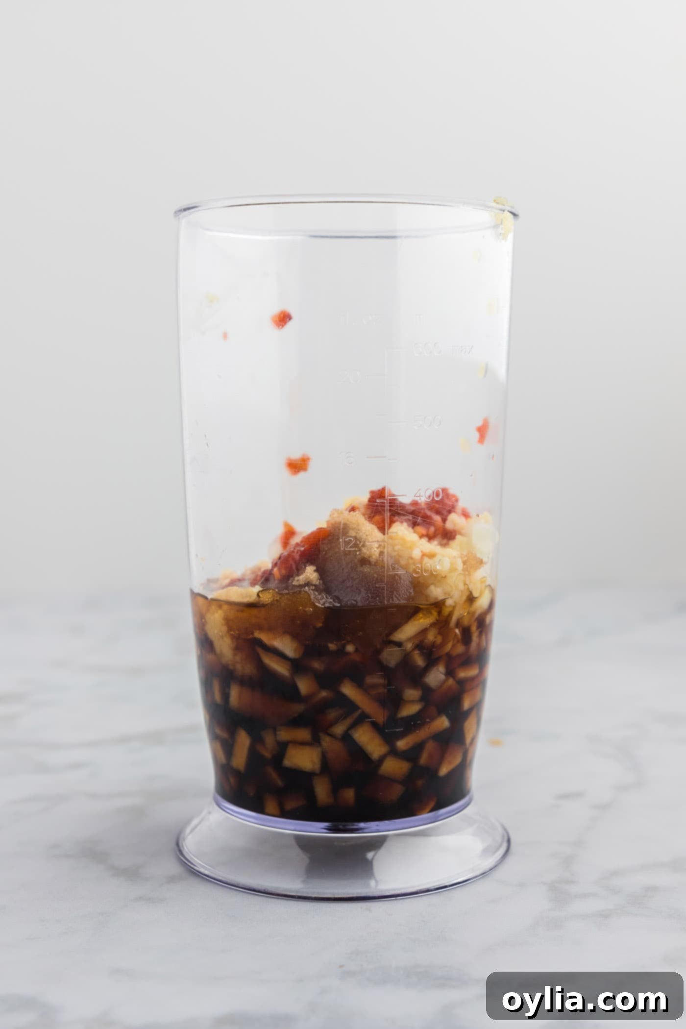 All the marinade ingredients for bulgogi ready in an immersion blender cup.