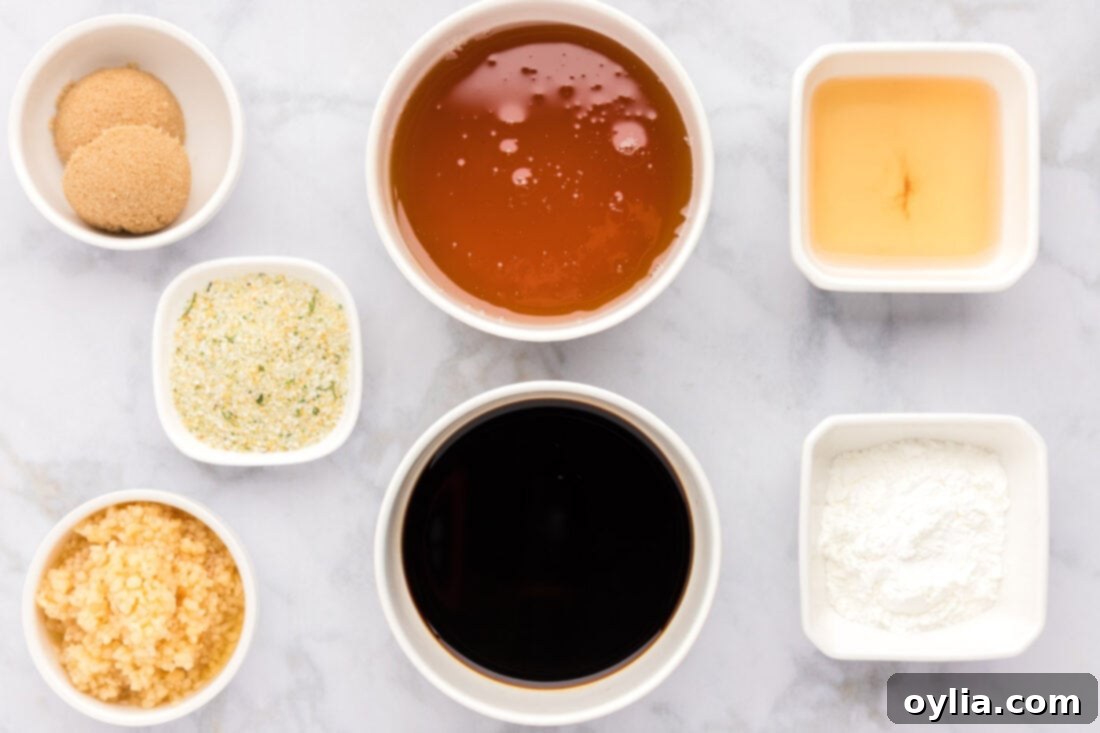 All the essential ingredients for Honey Garlic Chicken Marinade laid out on a cutting board.