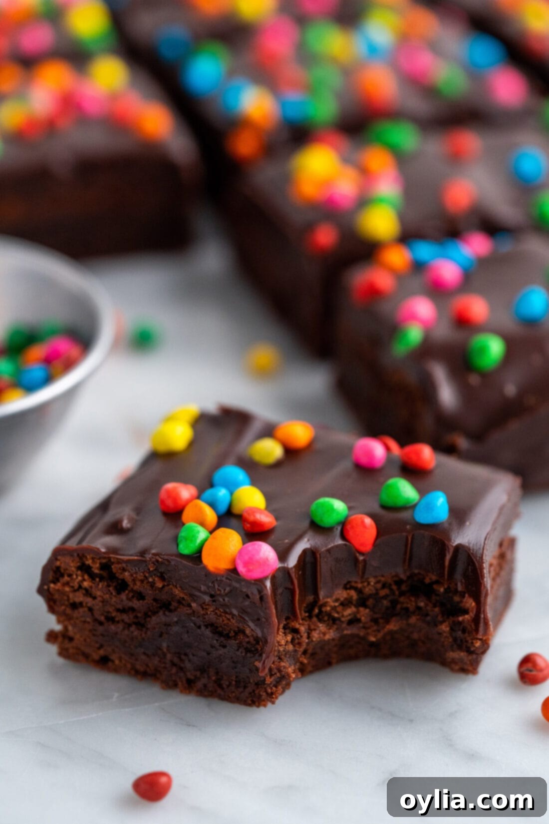 Stardust Brownies 3 Close up photo of a Cosmic Brownies with a bite taken out