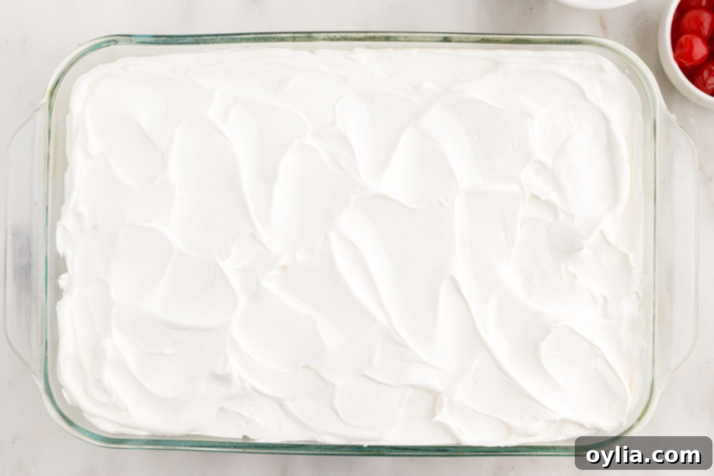 cool whip frosting on top of millionaire cake