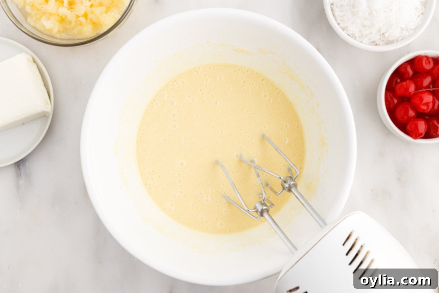cake mix blended in a bowl with a hand mixer