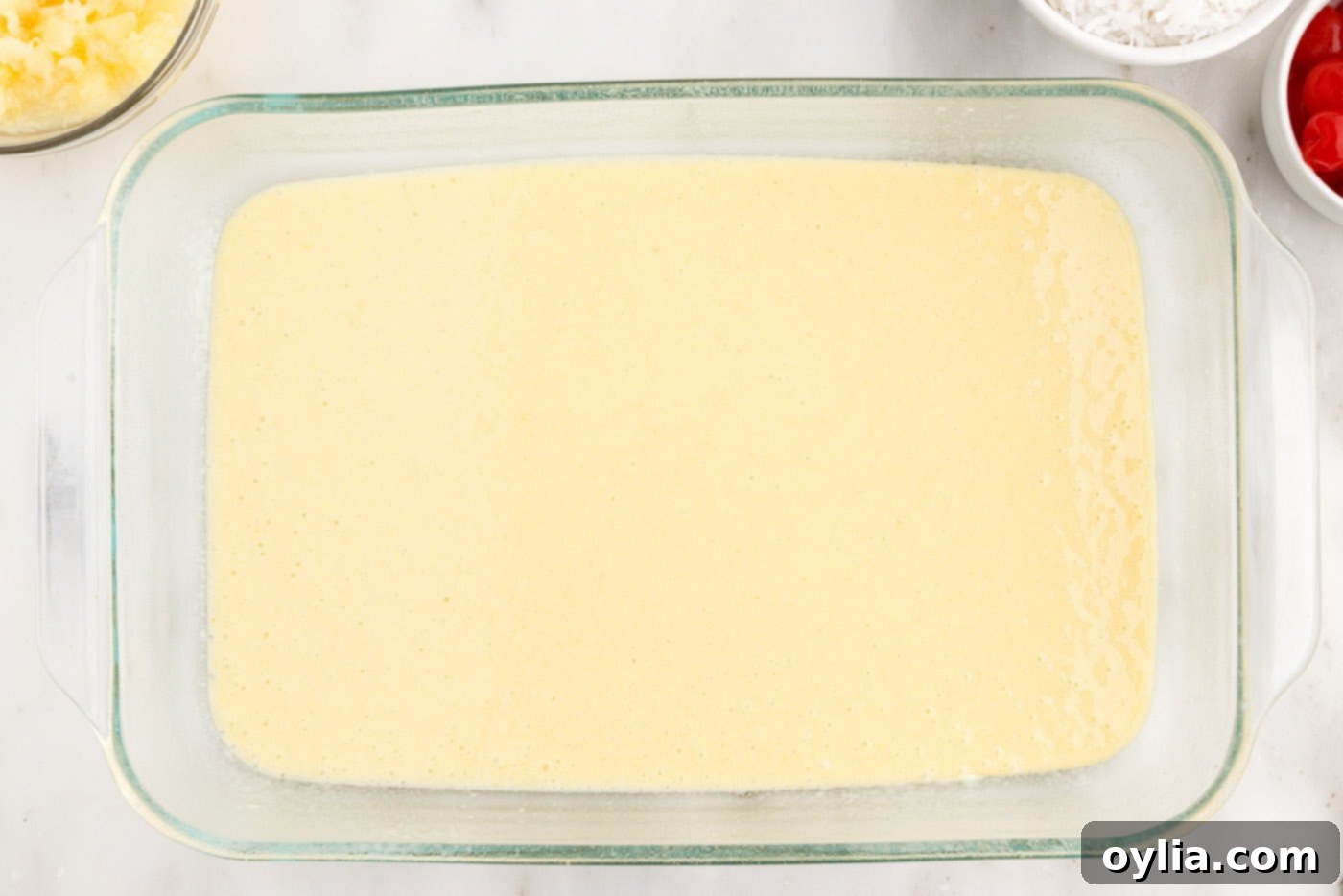 cake mix batter in a baking dish