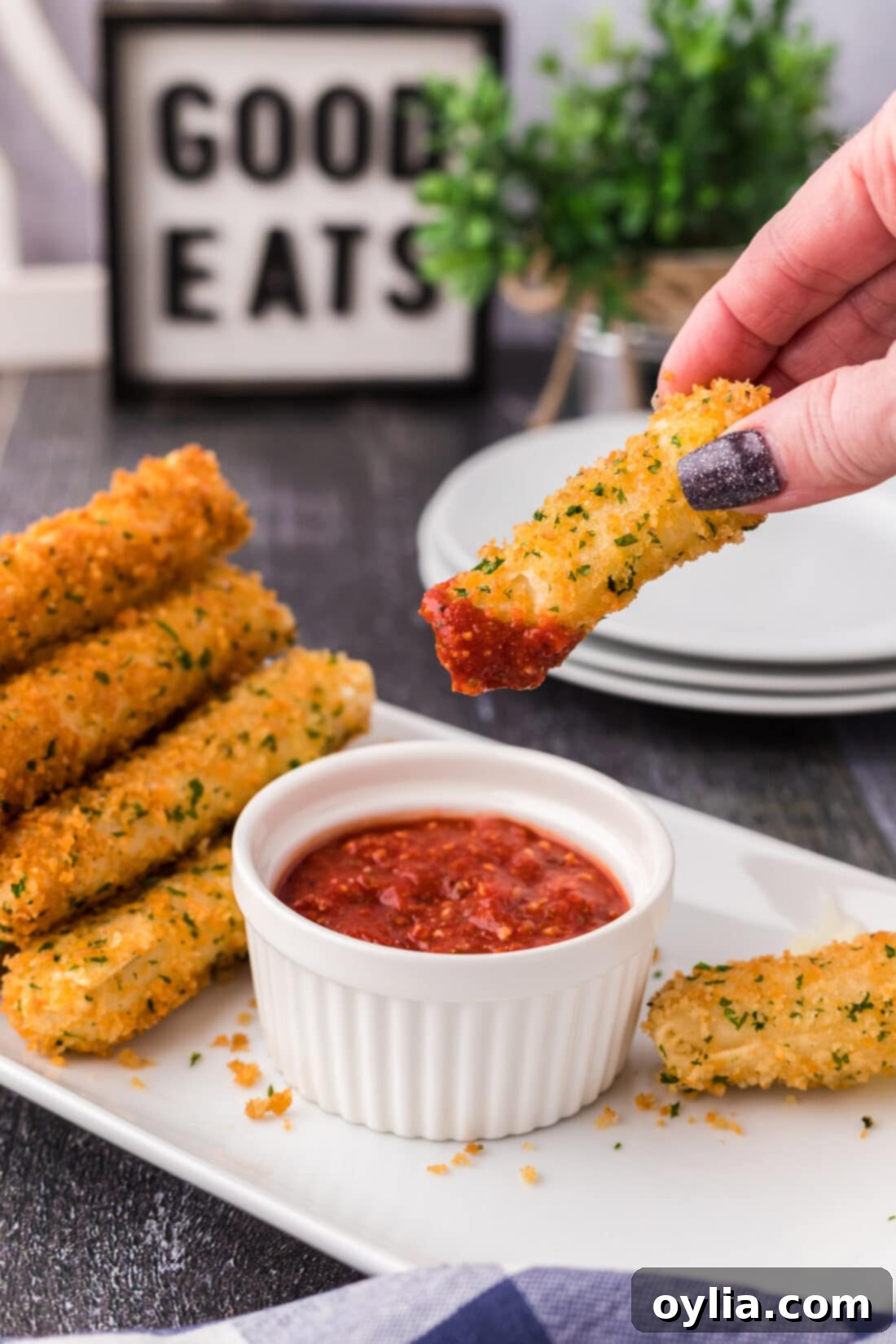 Wonton Cheese Stick dipped in marinara sauce
