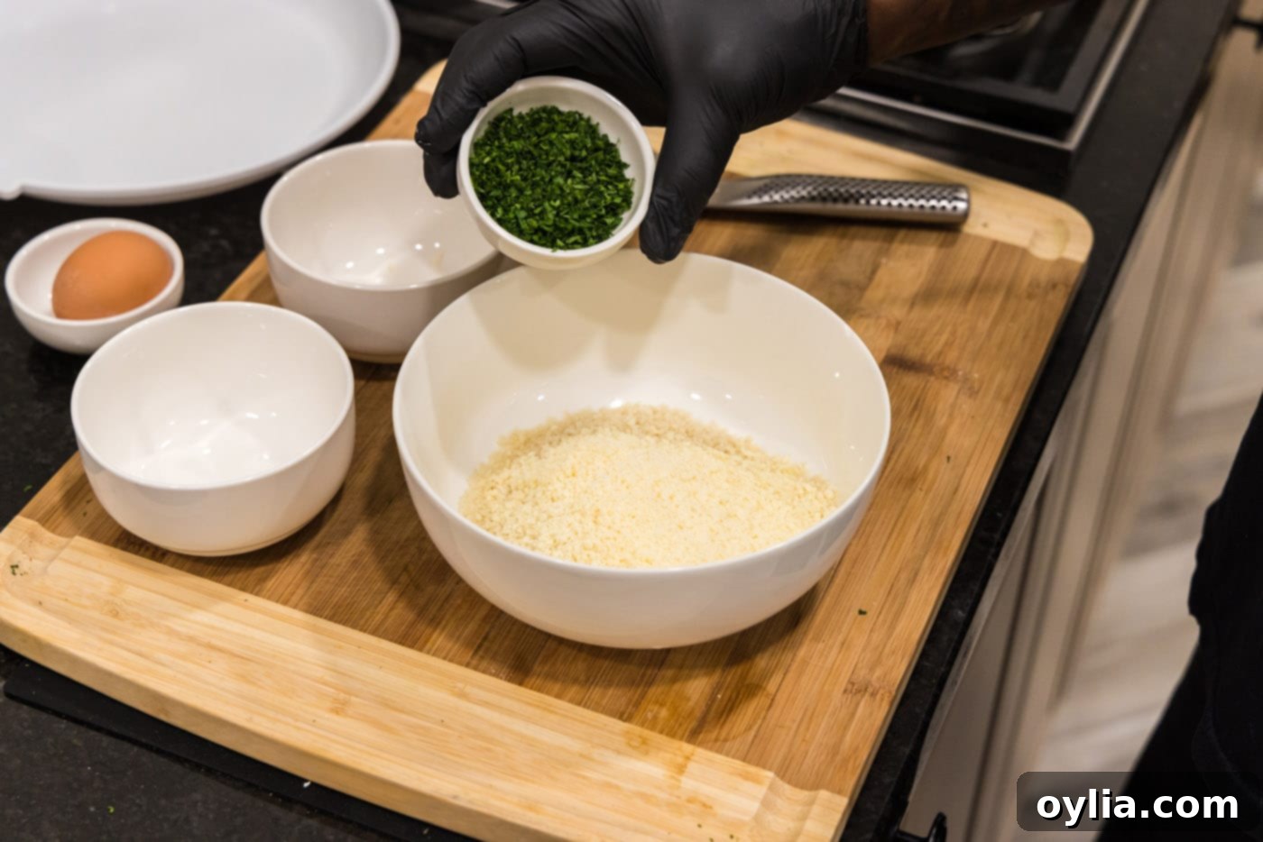 breadcrumbs, parsley, and parmesan cheese in a bowl