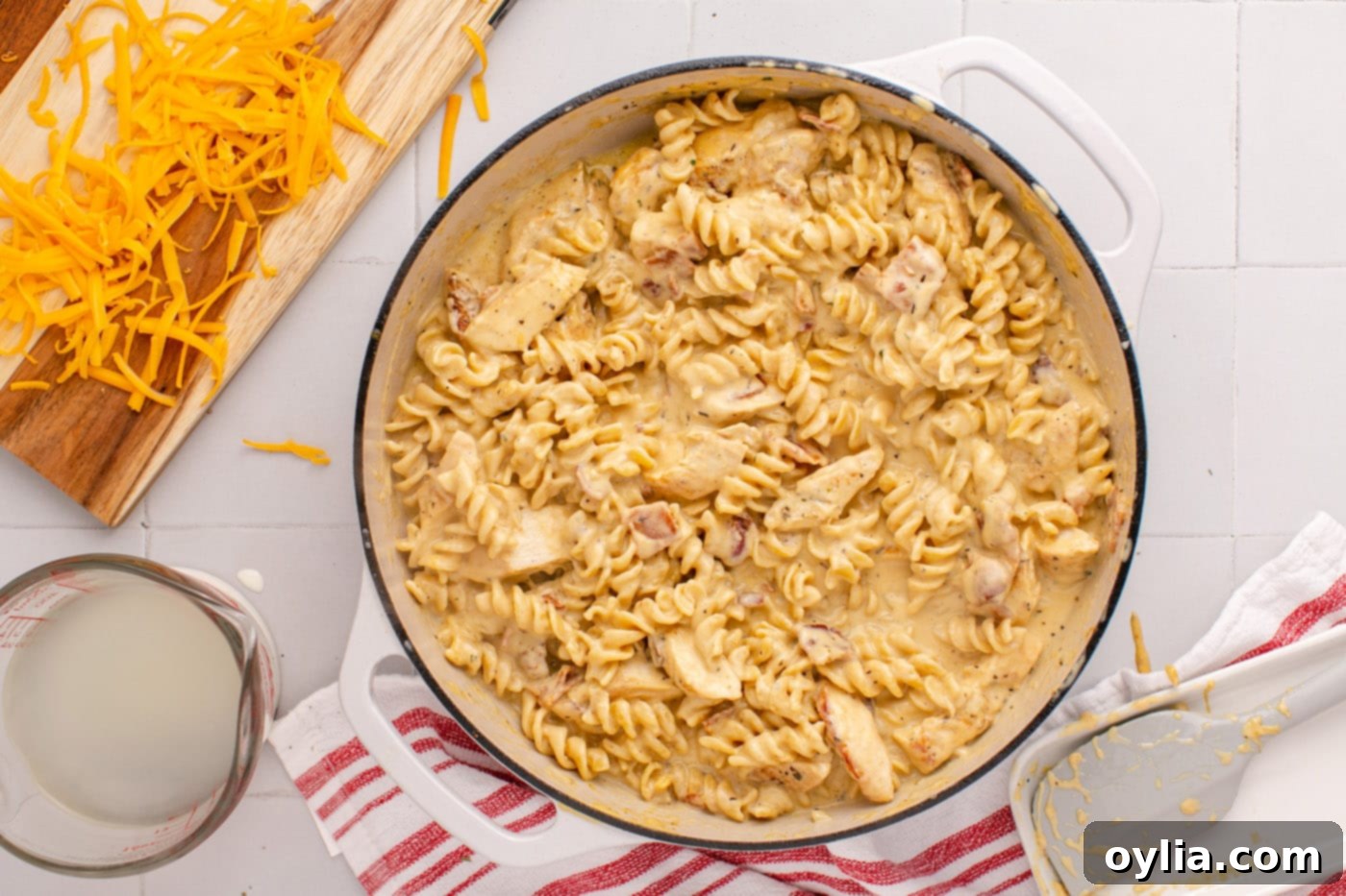 finished overhead shot of bacon chicken ranch pasta dish, garnished