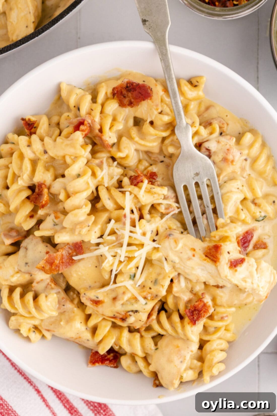 Bowl of Bacon Chicken Ranch Pasta with a fork in it
