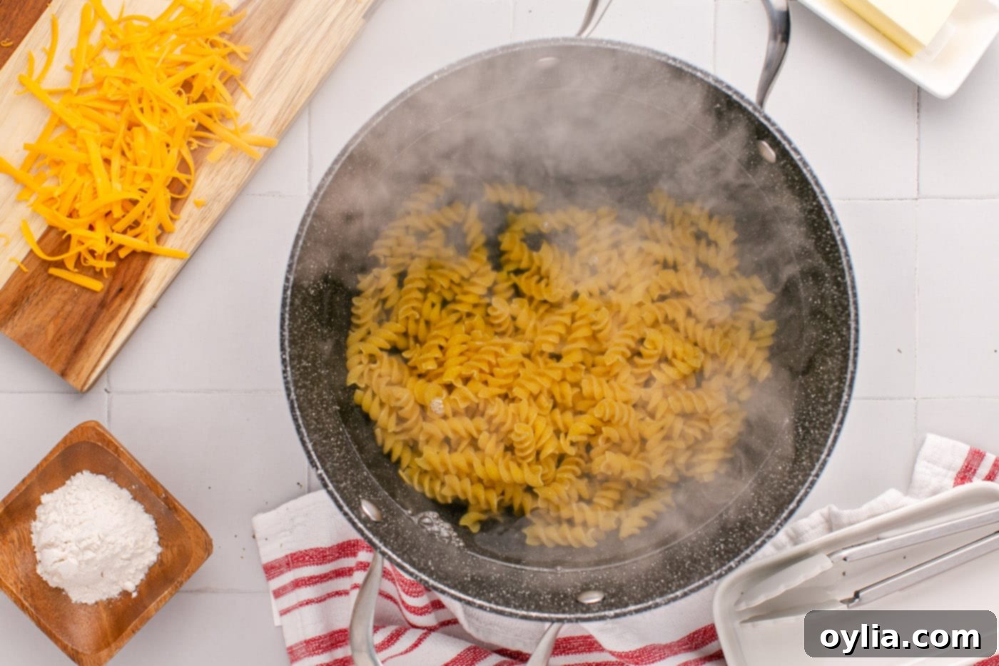 cooking rotini noodles in a pot of boiling water