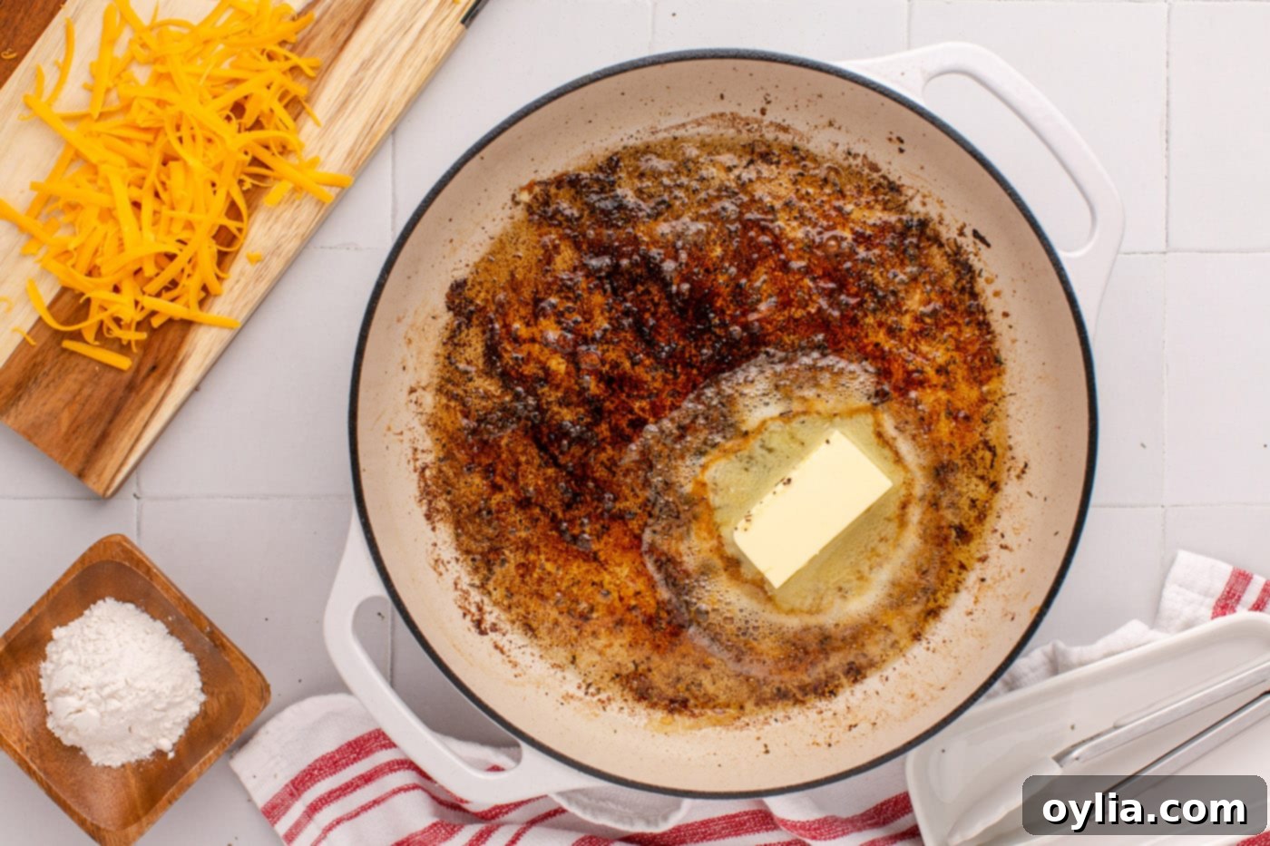 butter added to pan with chicken drippings