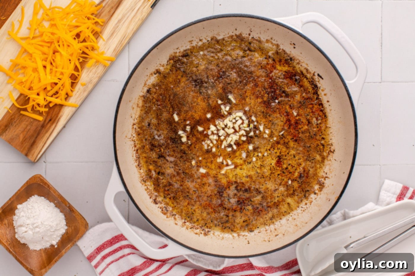 sauteeing garlic in melted butter and chicken drippings