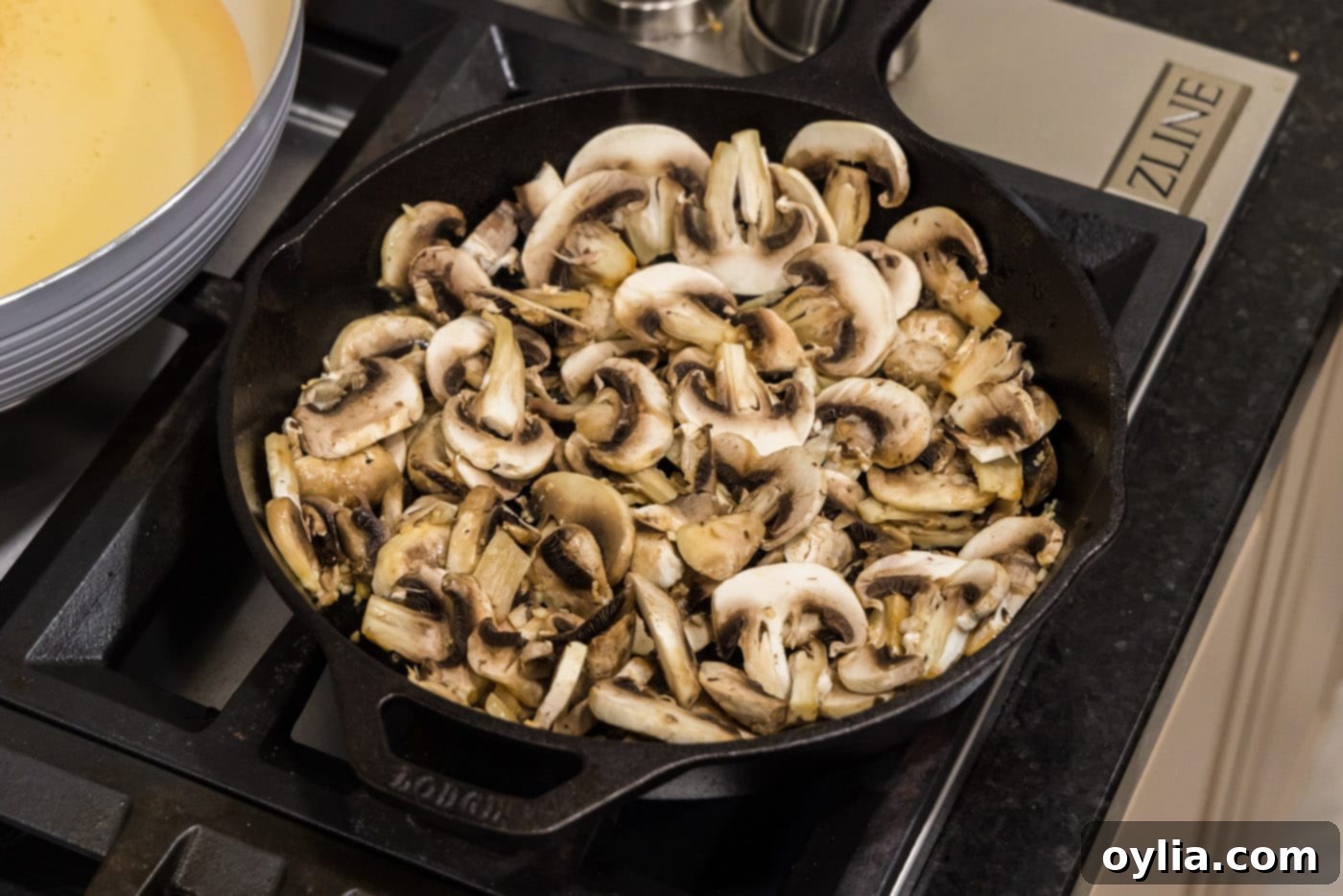 sliced mushrooms in a skillet