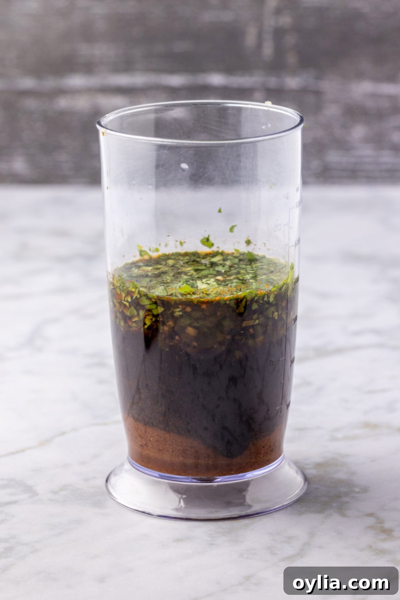 fajita marinade ingredients in an immersion blender