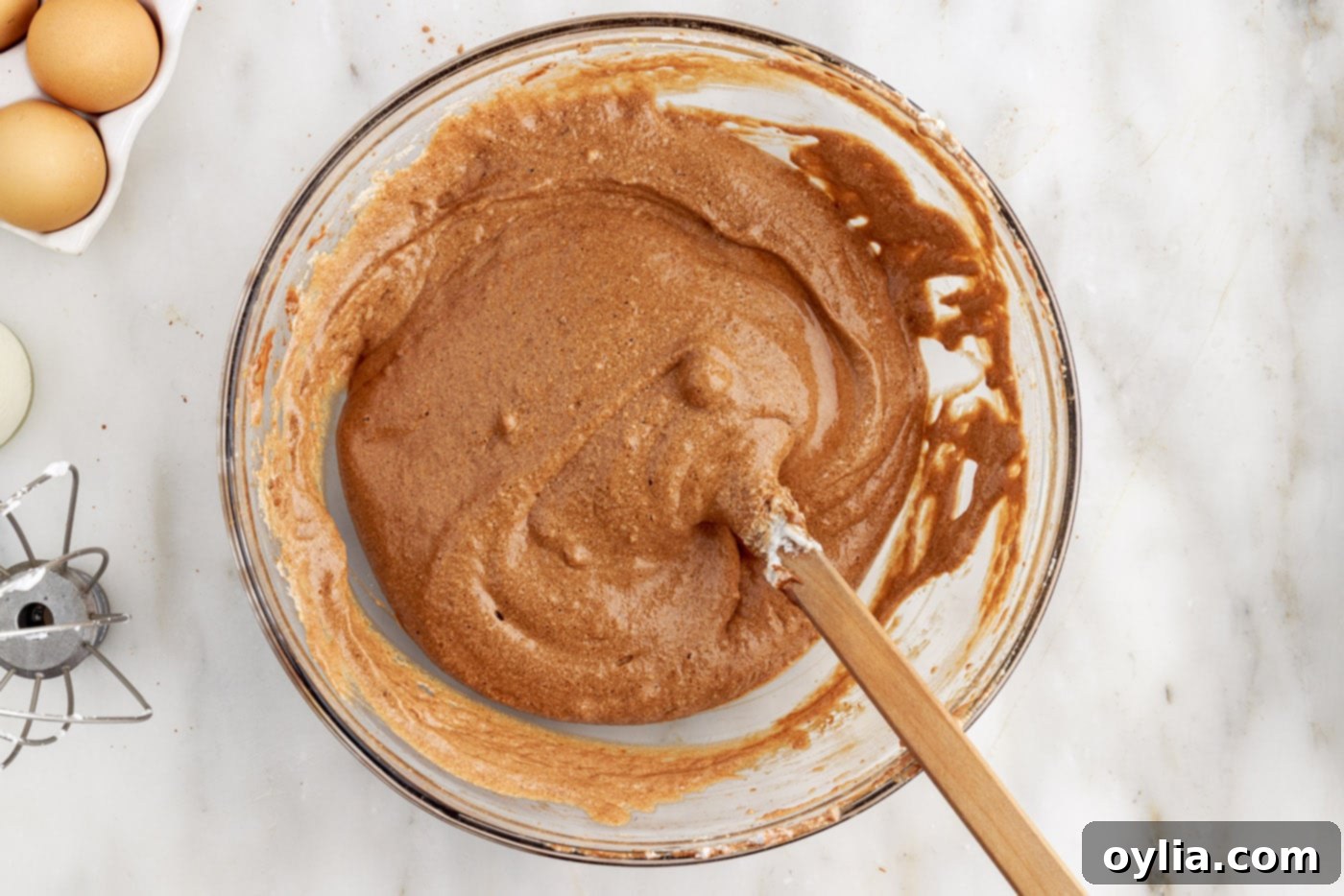 smooth chocolate swiss roll cake batter ready for baking