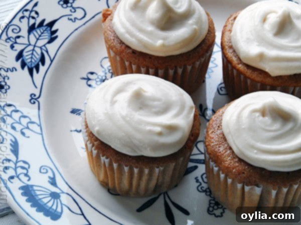 Homemade-style carrot cupcakes made easy with a doctored cake mix recipe.