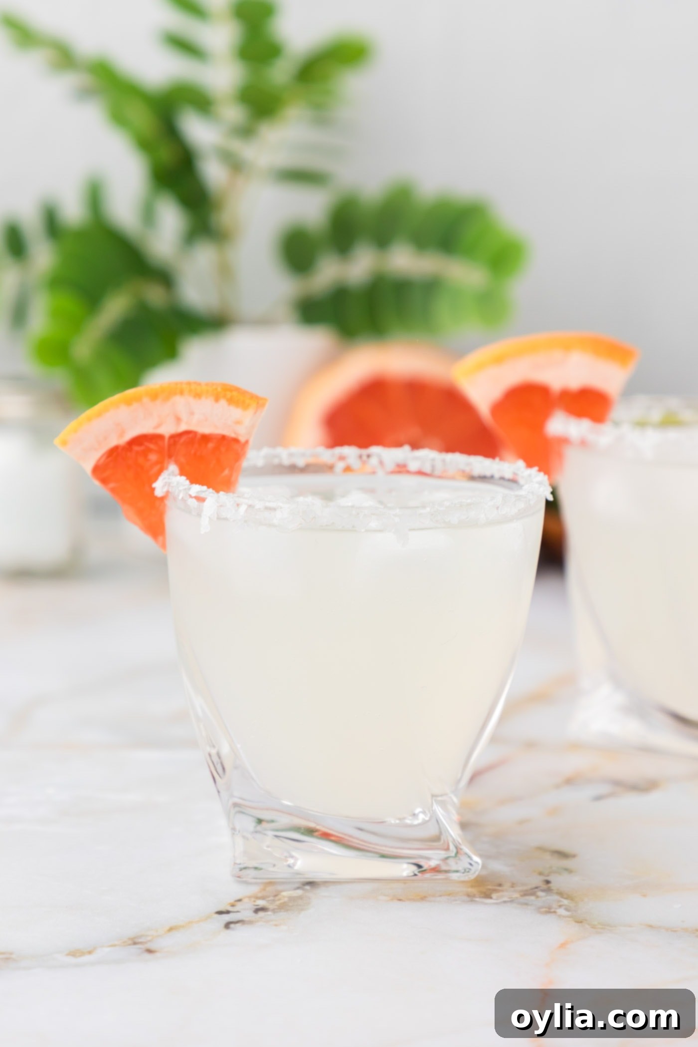 paloma cocktail garnished with grapefruit wedge