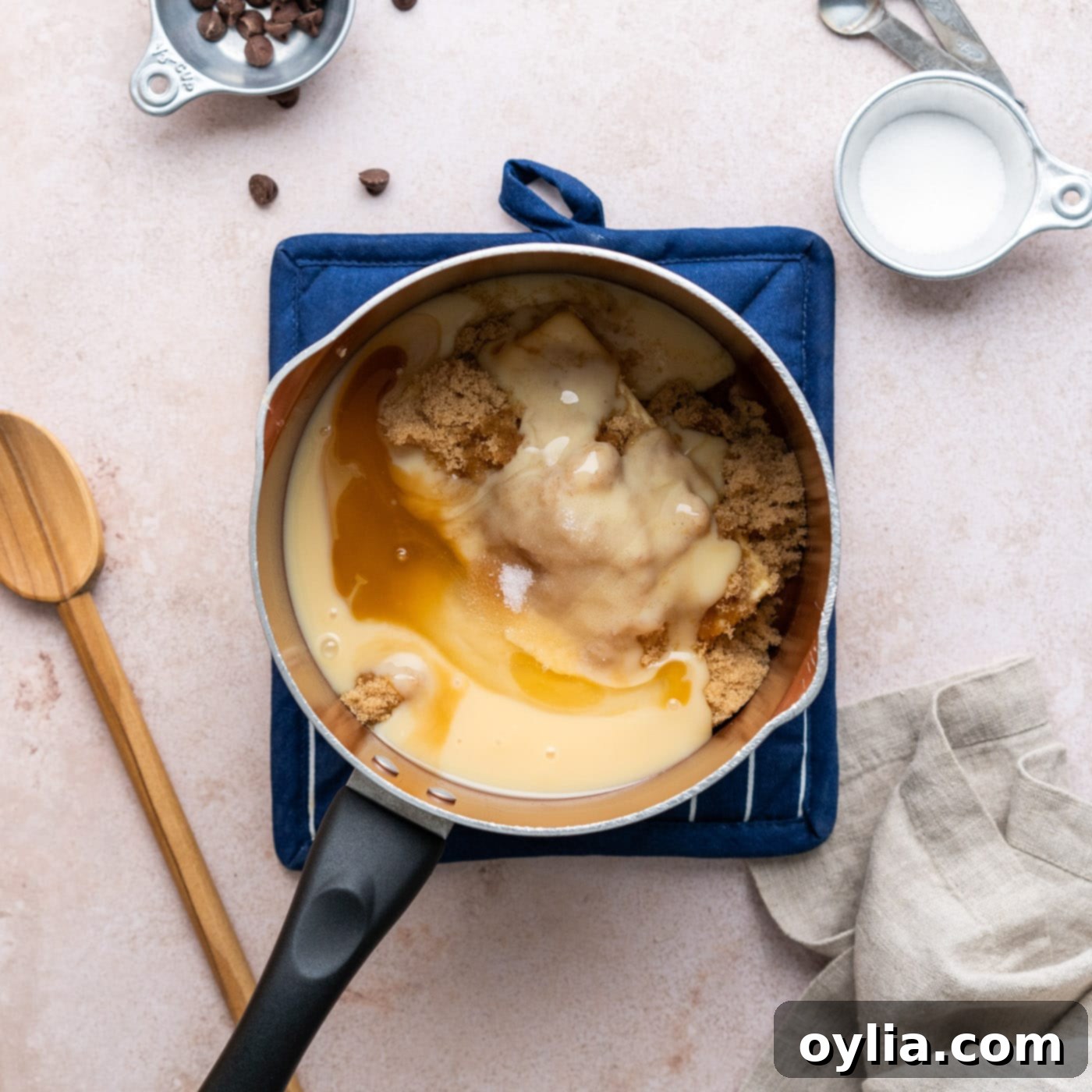 homemade caramel ingredients in a saucepan before cooking