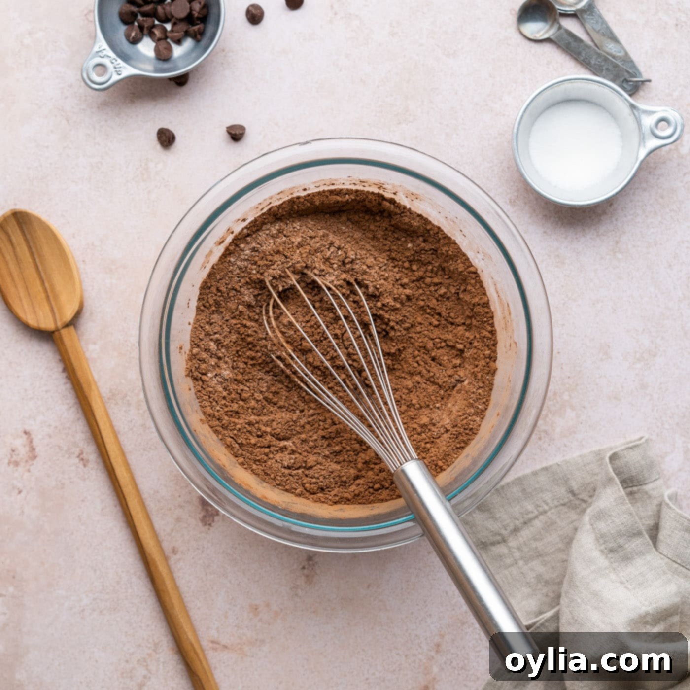flour, cocoa powder, and salt whisked in a bowl for brownie batter
