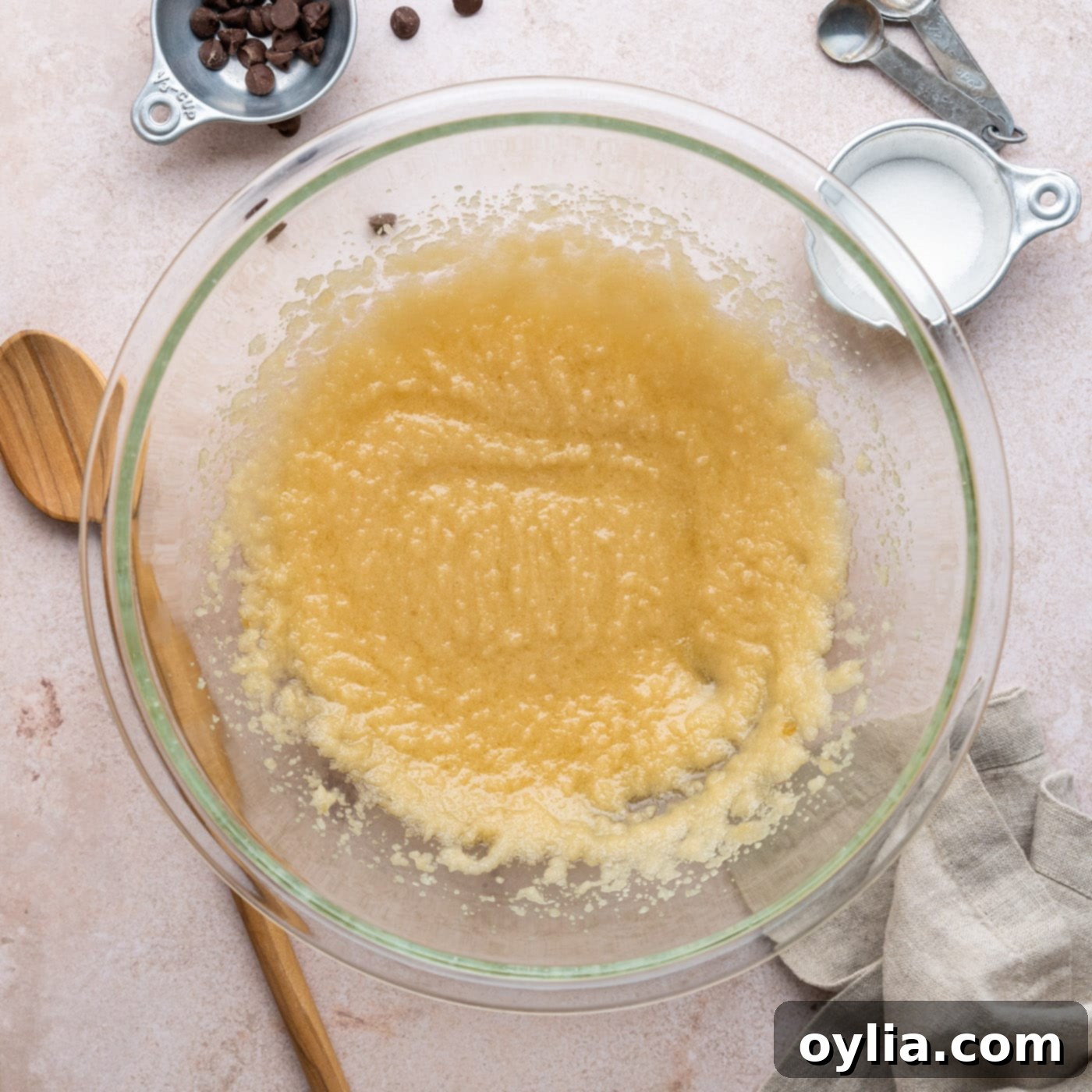 sugar, butter, and oil mixture in a bowl after initial beating