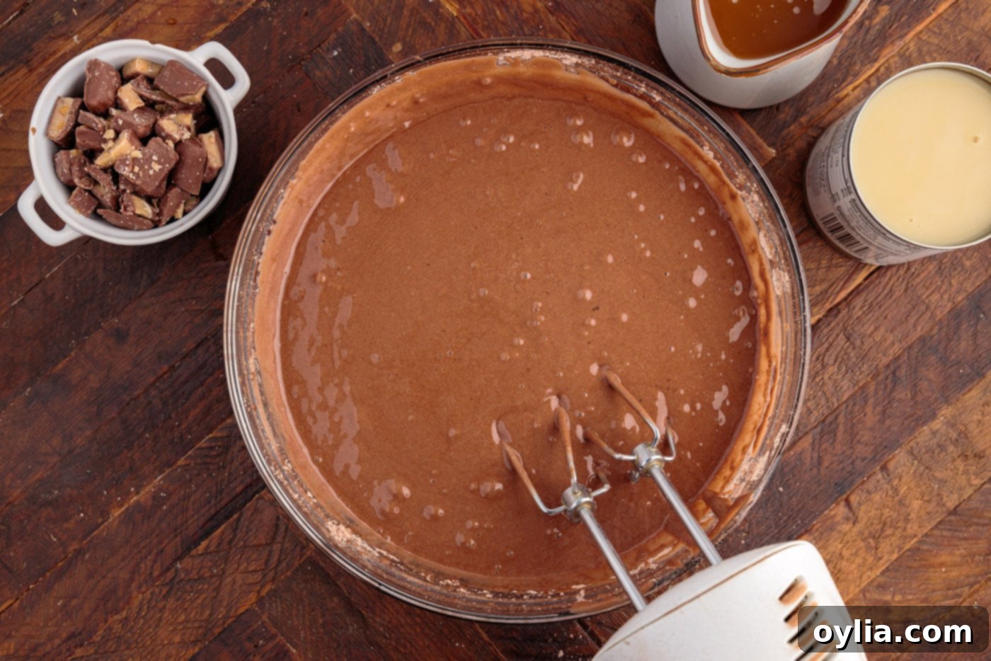 Well-mixed cake batter in a bowl, ready for baking.