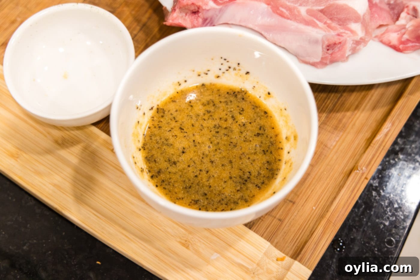 A close-up of the well-mixed seasoning rub in a bowl, ready for application.