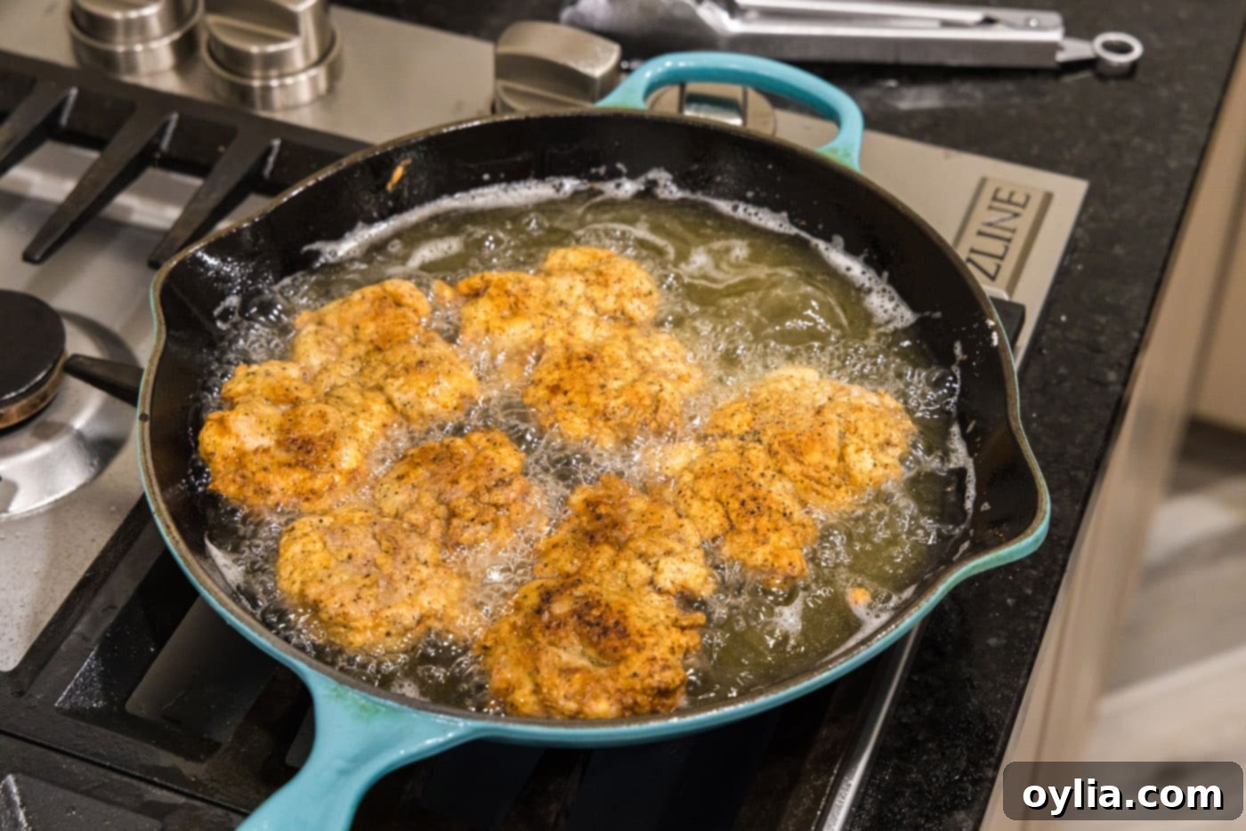 fried chicken thighs in a skillet