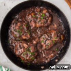 Skillet of Veal Marsala with tender cutlets and rich sauce.