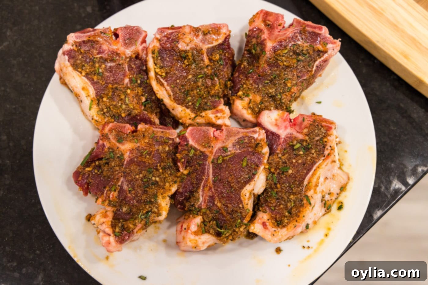 seasoned lamb loin chops on a plate