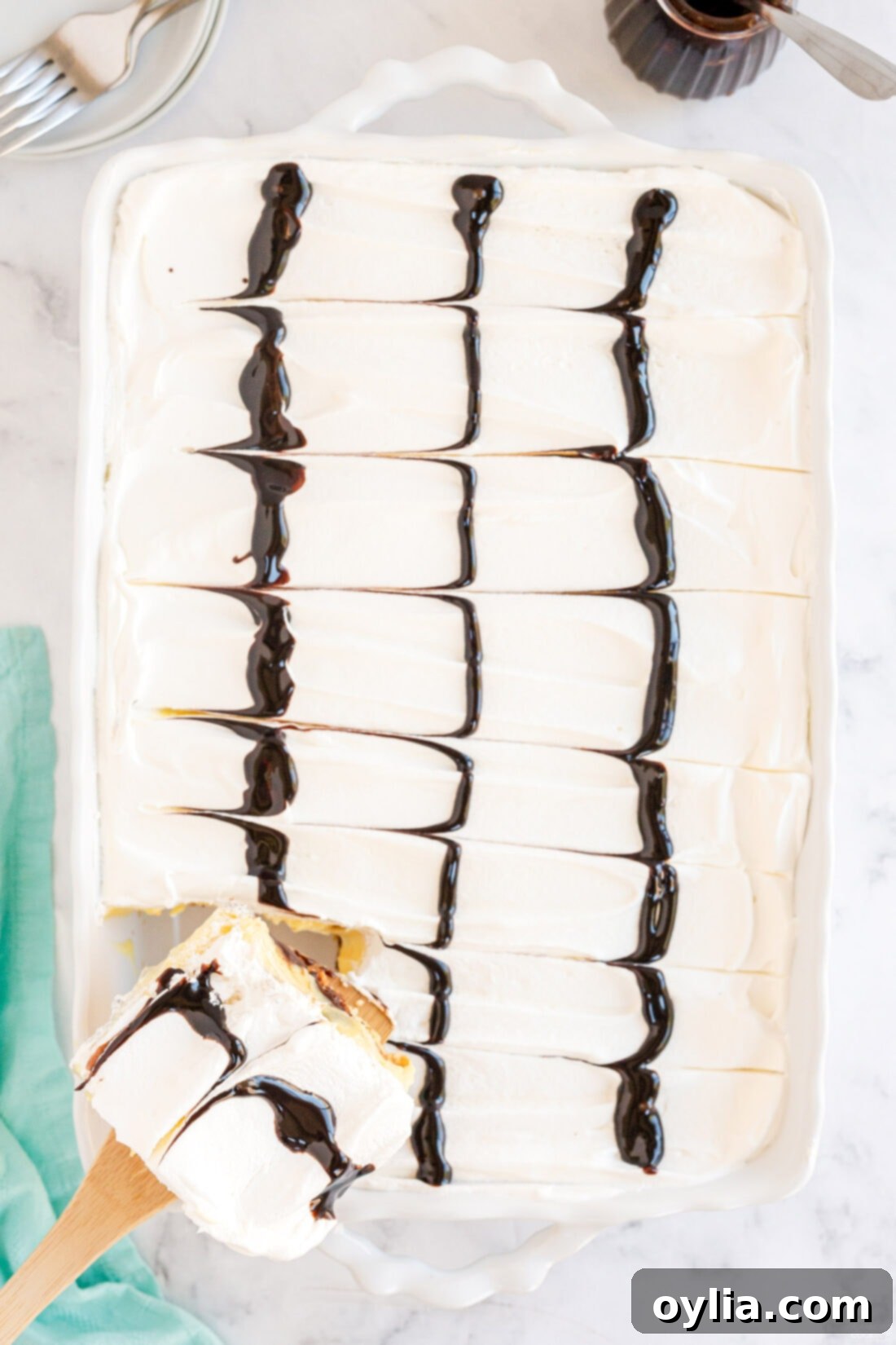 over head view of pan of Cream Puff Chocolate Eclair Cake