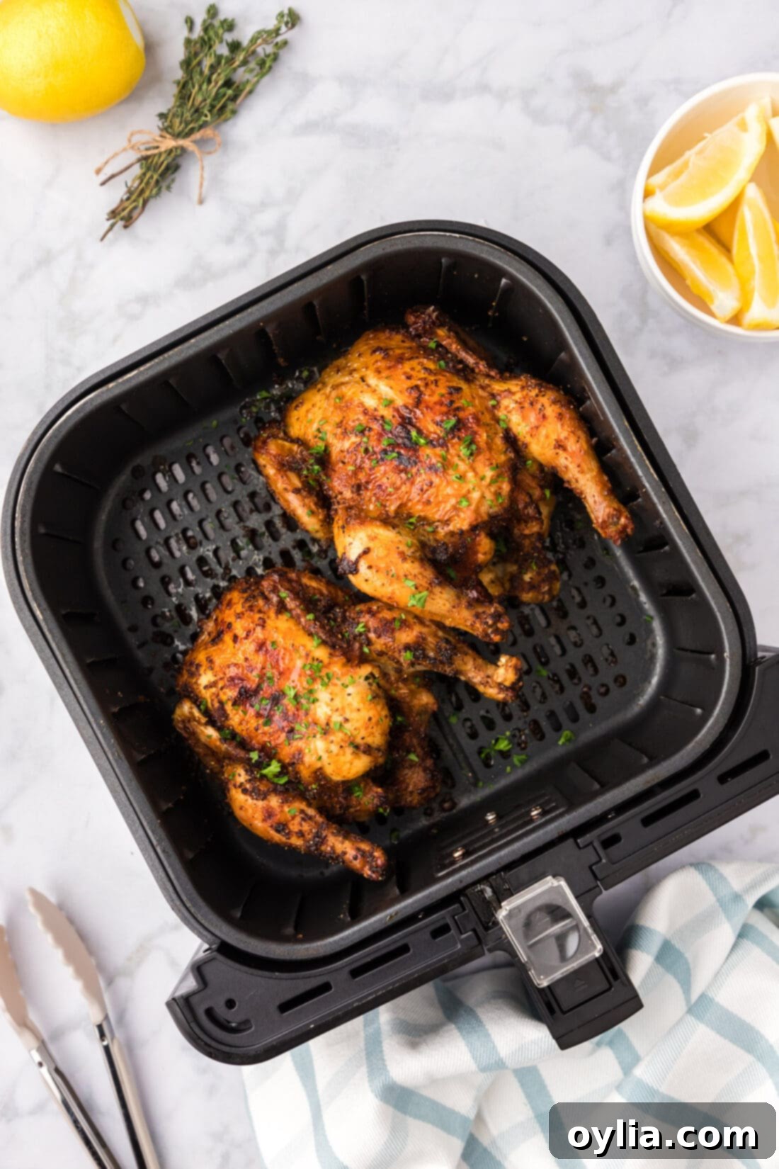 Air Fryer Cornish Hens in an air fryer basket